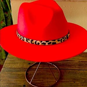 Red felt hat with cheetah band